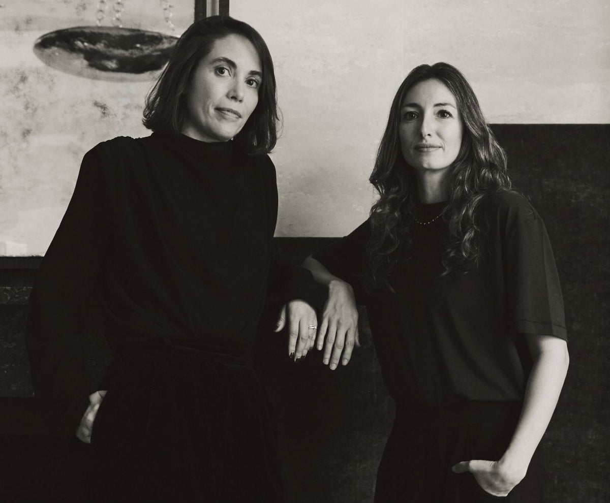 Black-and-white portrait of Tala Fustok and Armelle Goury at Tala Fustok Studio