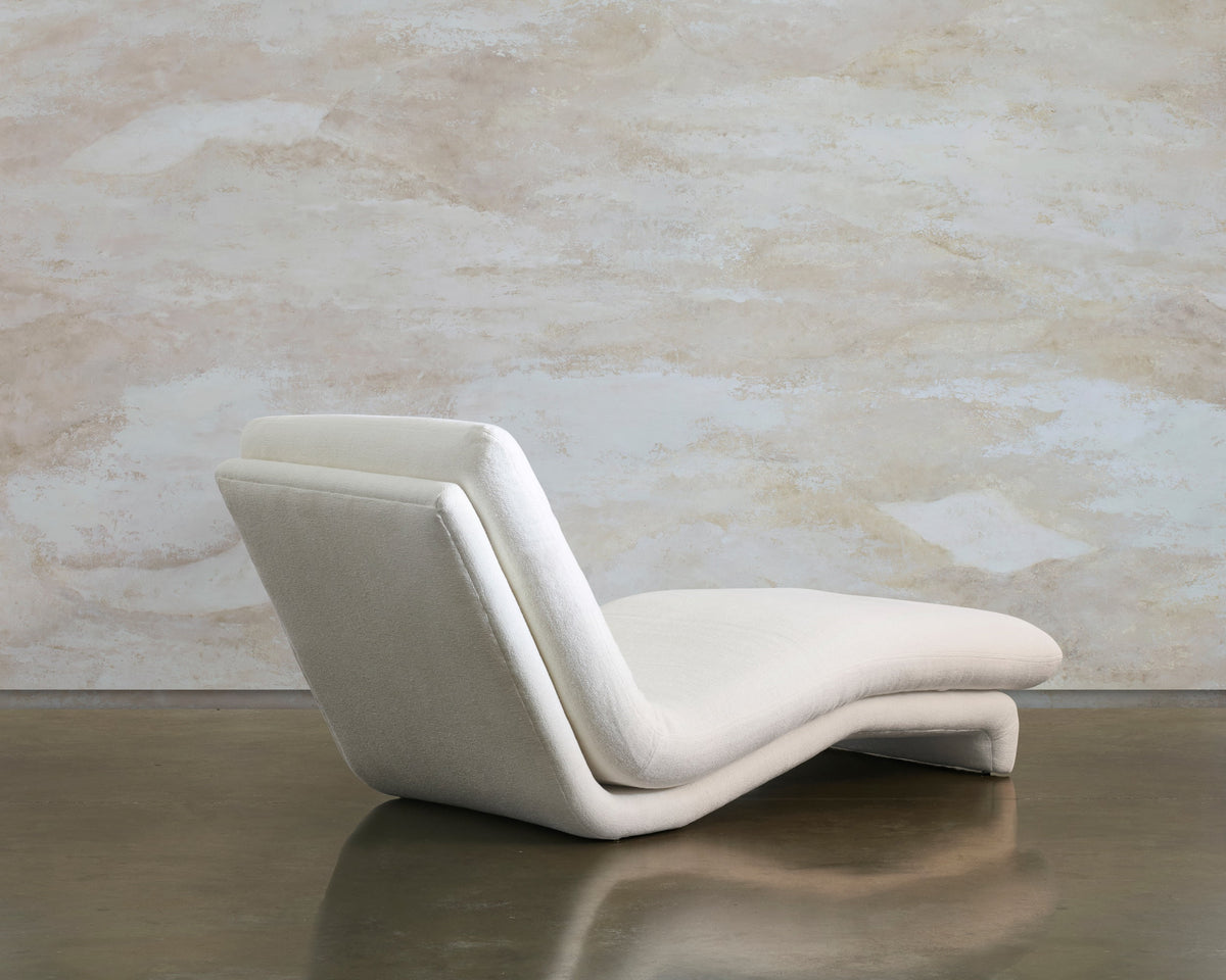 Rear view of the Path chaise, showing its curved cream back and extended footrest