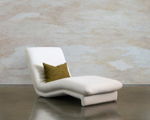 Path chaise longue by Tala Fustok Studio in cream upholstery, with an olive cushion on the reclined seat