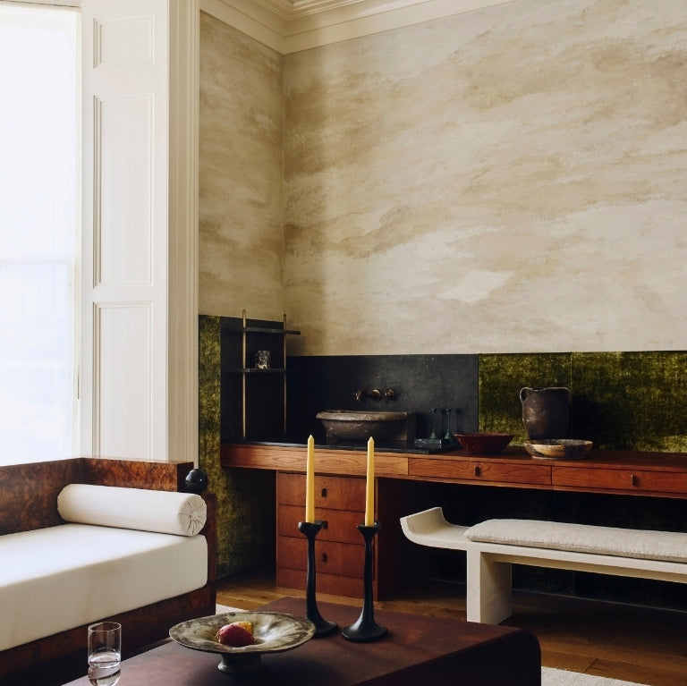 Study with walnut millwork, a stone basin, and olive velvet walls in the Ladbroke Grove apartment